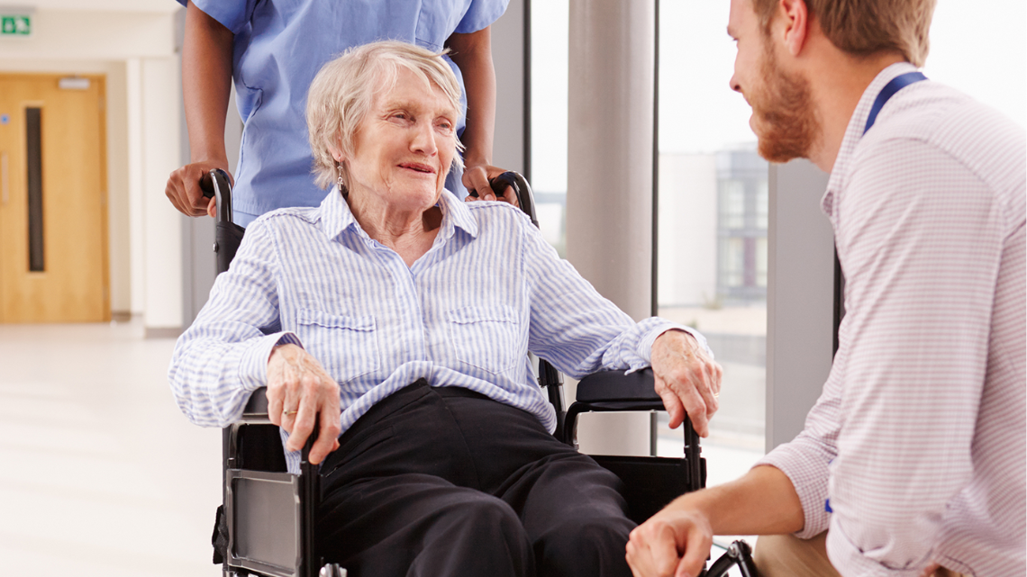 patient talking with healthcare worker
