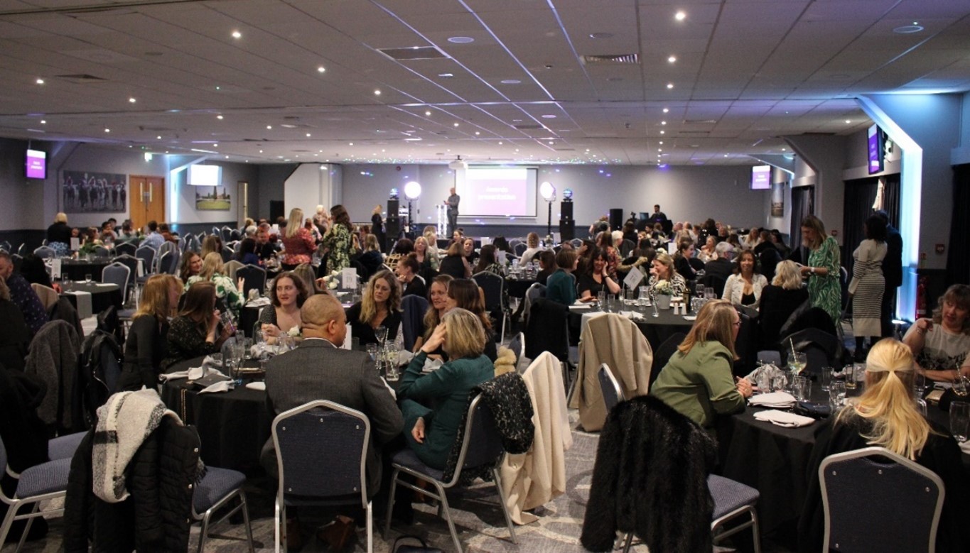 Staff sitting at tables at the First Community staff awards evening